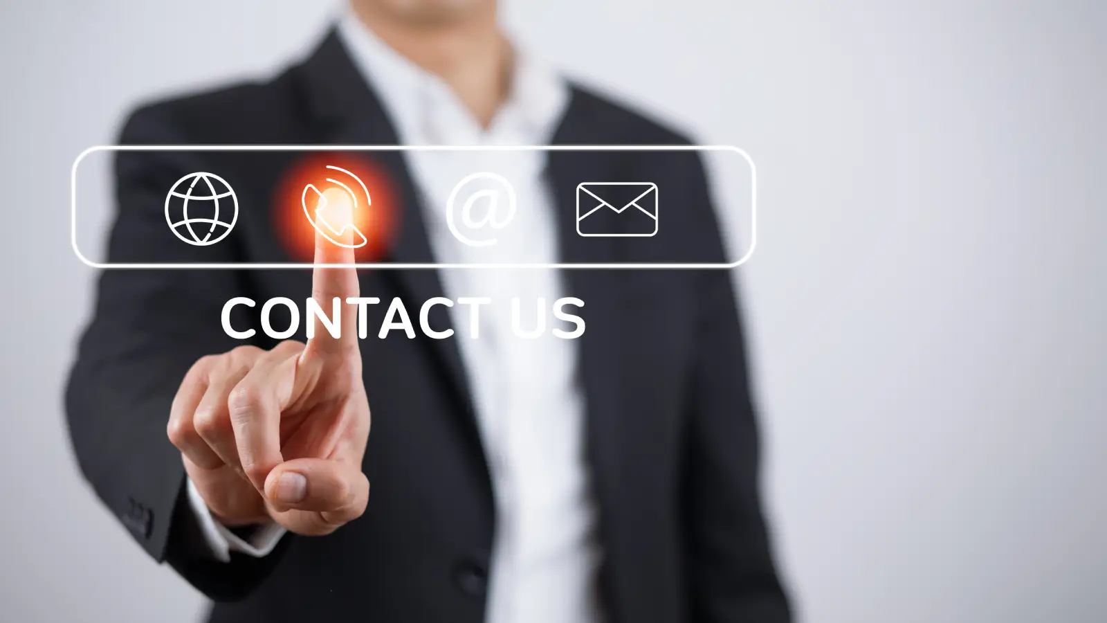 Concept communication and Contact us or Customer support hotline people connect. Business hand touching on virtual screen contact icons, email and address, live chat with internet wifi.